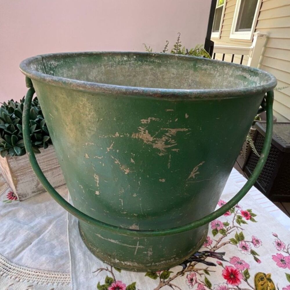 Painted antique bucket; old green paint, primitive garden bucket